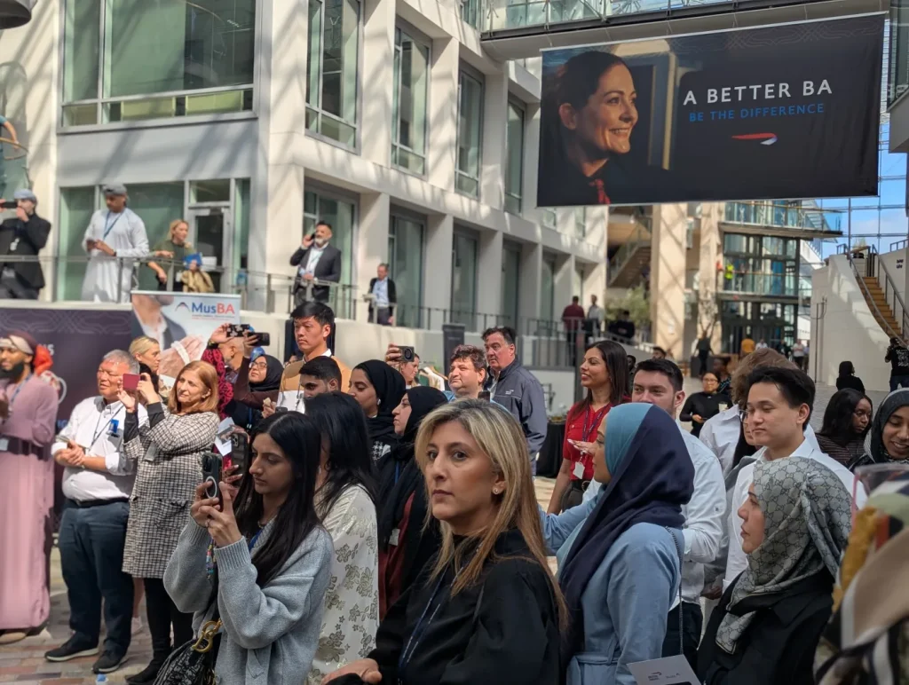 Visitors crowding around an Exhibition Islam stand