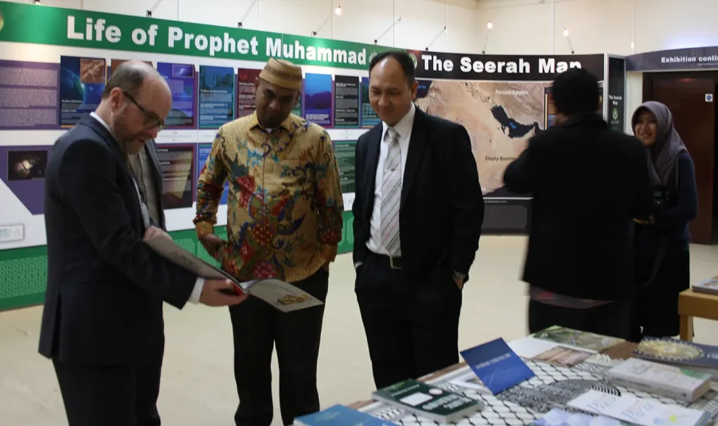 Visitors from the Indonesian parliament at an Exhibition Islam display